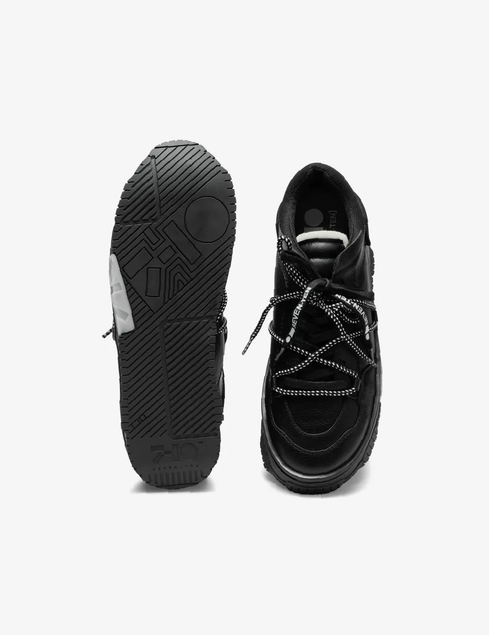 702 triple black low top sneaker