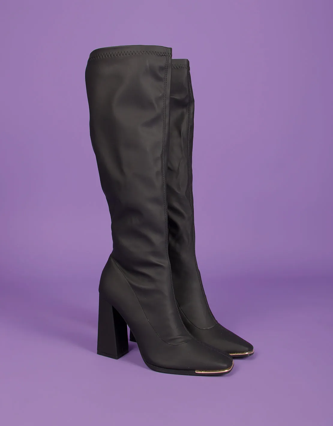 Knee high heeled sock boots