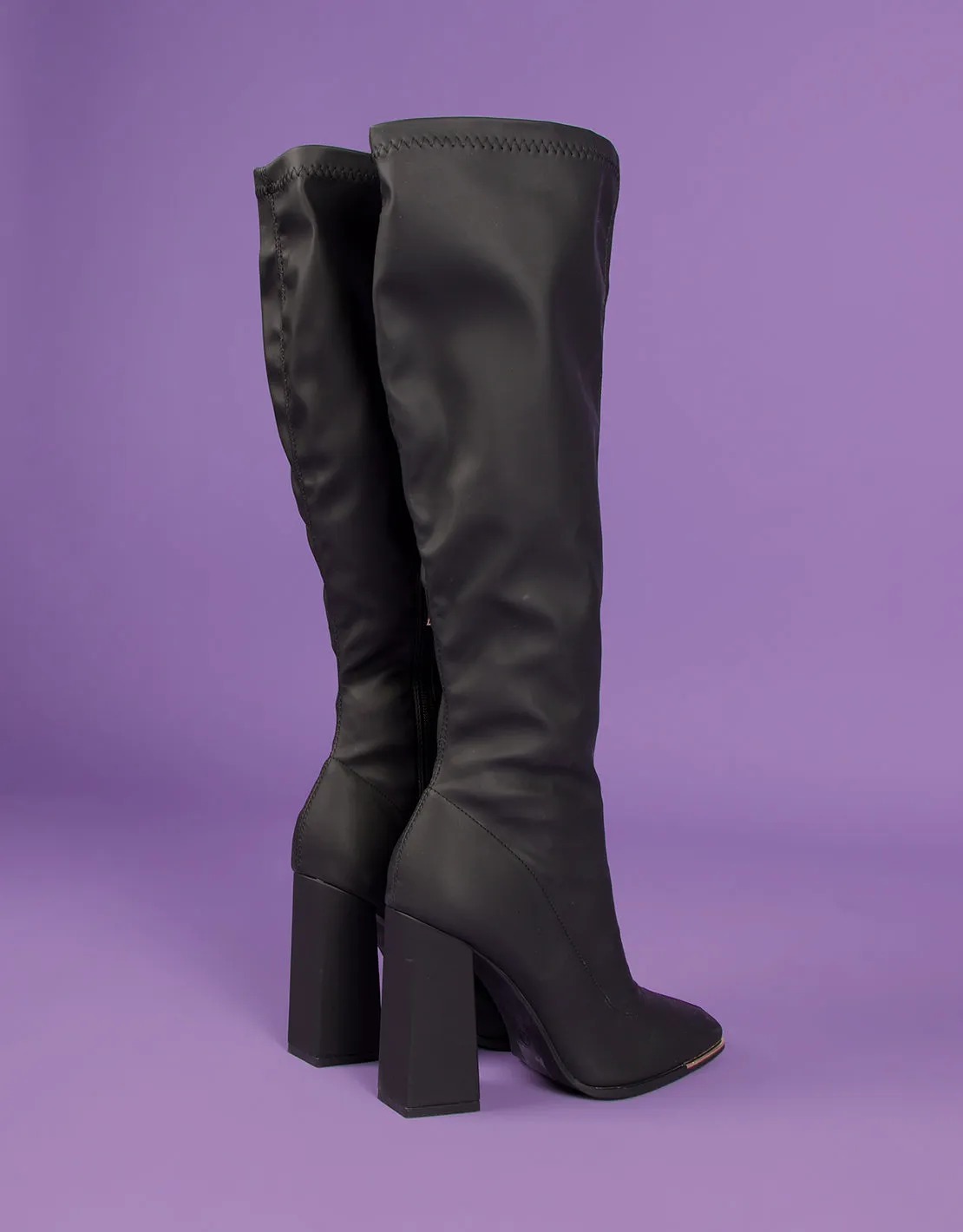 Knee high heeled sock boots