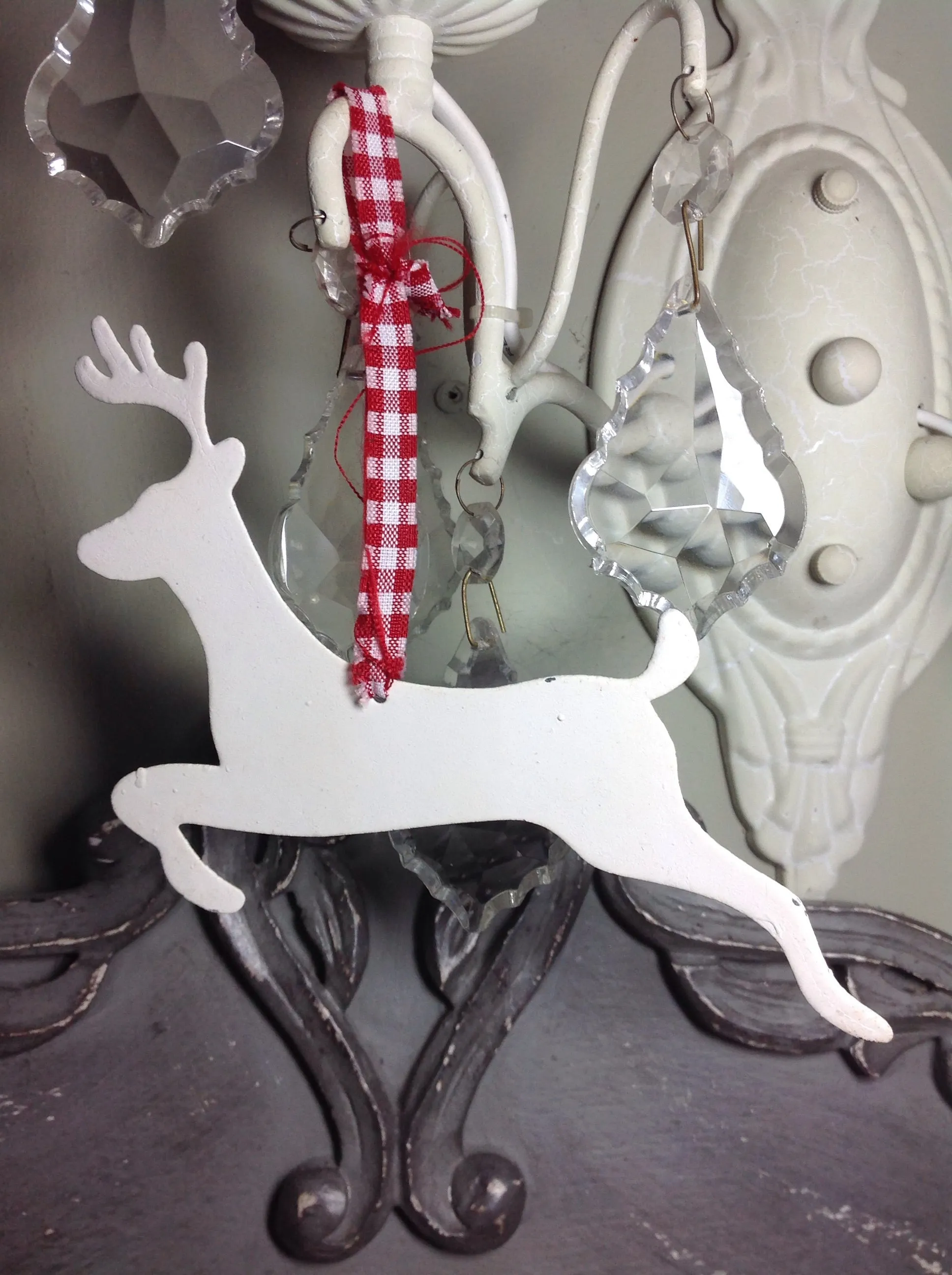 Leaping cream metal reindeer with gingham ribbon loop tree decoration